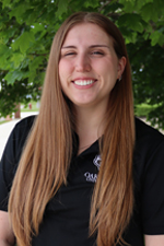 A professional headshot of Olivia R. in a black Oakland University shirt.