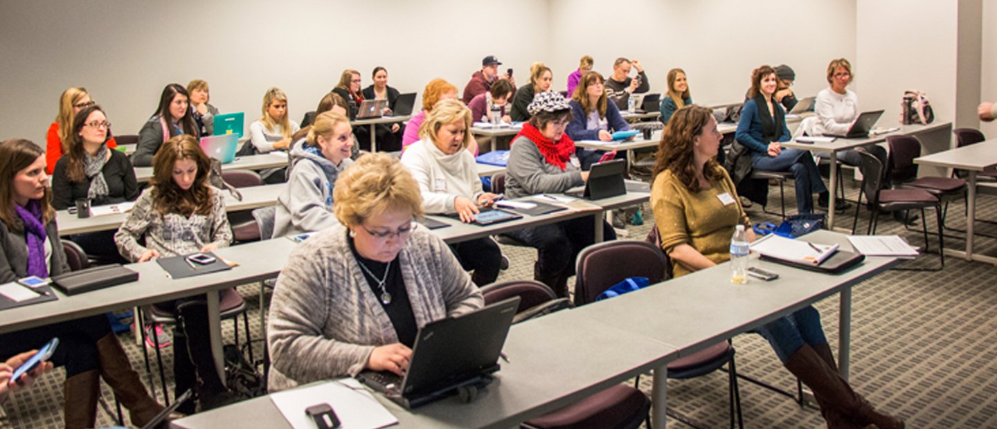 Group of people sitting at desks